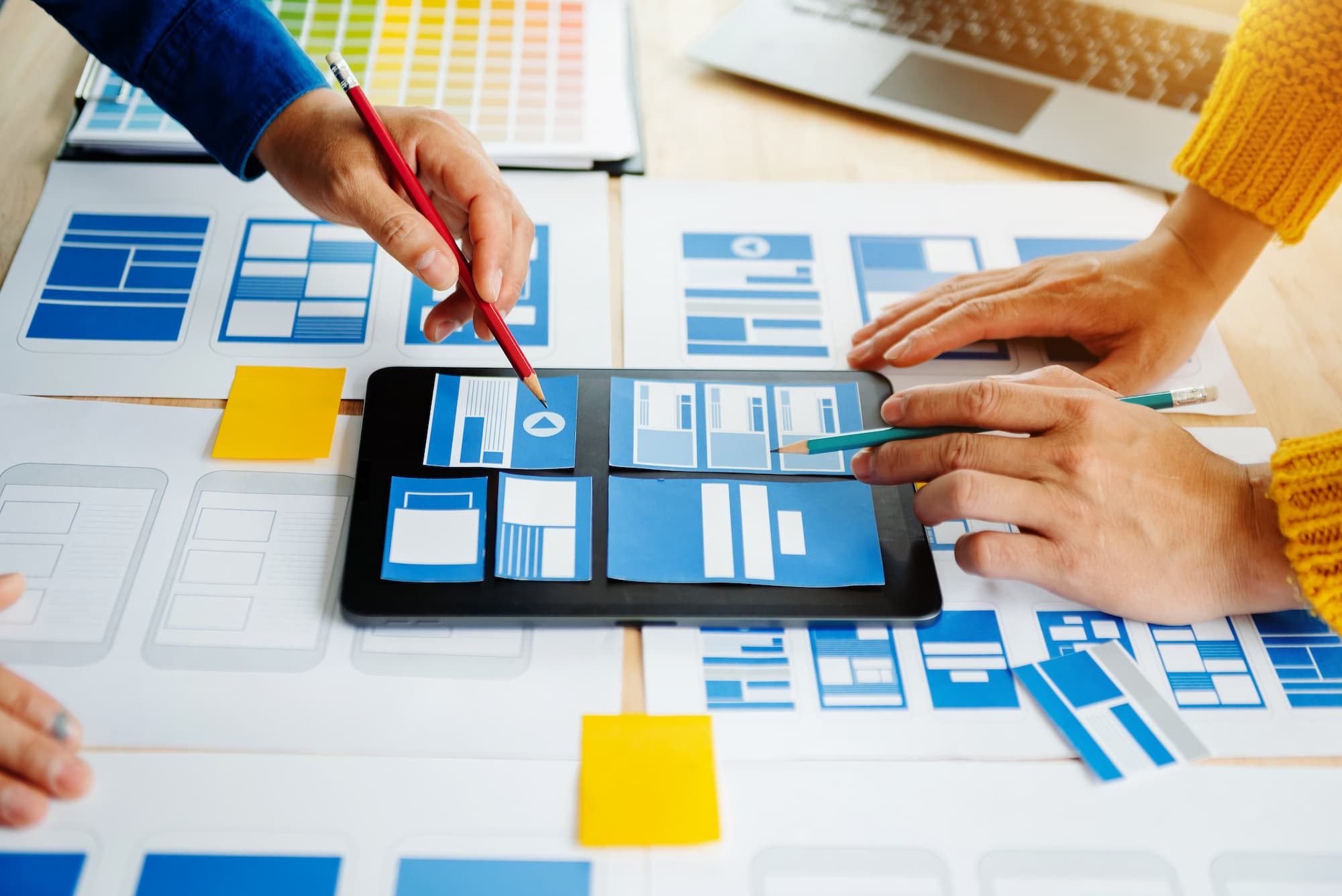 Planning responsive website layouts with wireframes and a tablet